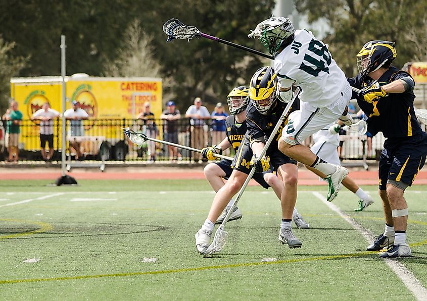 Jacksonville University's Dwayne Mattushik mid air at the Moe's Lacrosse Classic. Marcelo Murillo / Shutterstock.com