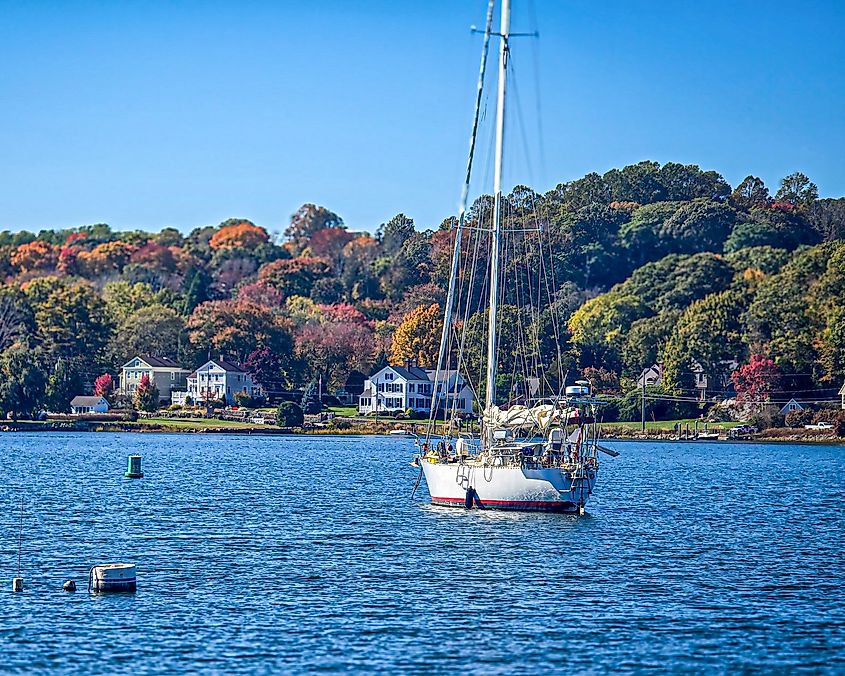 Sailboat anchored on the Mystic River in Mystic, Connecticut.