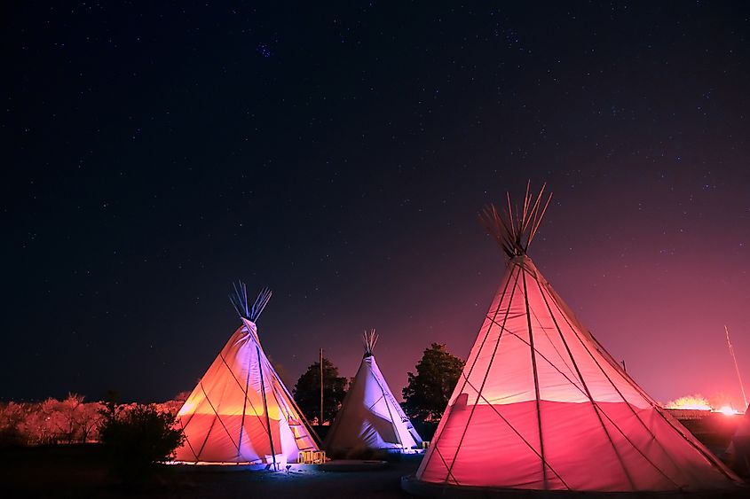 Teepee's glowing at night in Marfa, Texas.