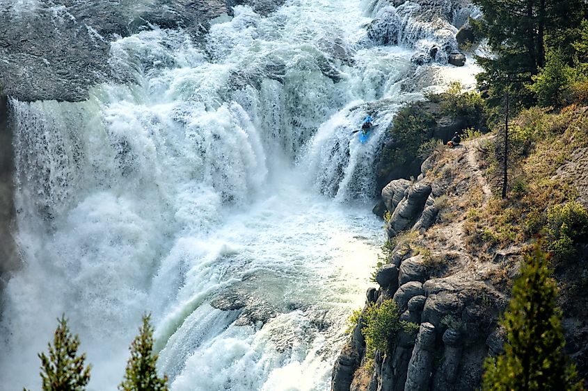 A kayaker navigates Mesa Falls.