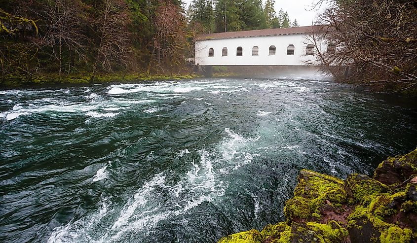 Historic Belknap Bridge over the Upper McKenzie River in the Willamette National Forest of Oregon.