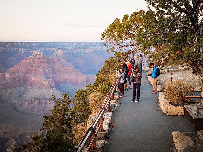 Tourist Watch The Sunset From Mohave Point Overlook View of Grand Canyon South Rim. Editorial credit: hafakot / Shutterstock.com