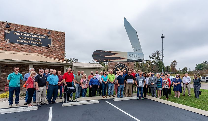 Members of the community stand with Jason Basham during the ceremony recognizing the achievement of making the Guinness Book of World's Record, Radcliff, Kentucky.