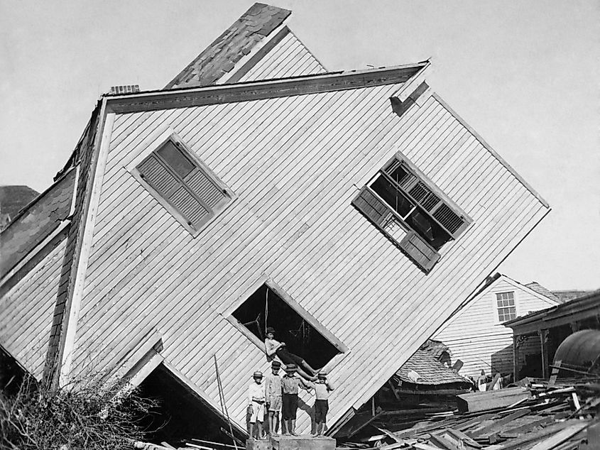 A house tipped on side after the 15 foot storm surge of the Galveston Hurricane of Sept. 1900.