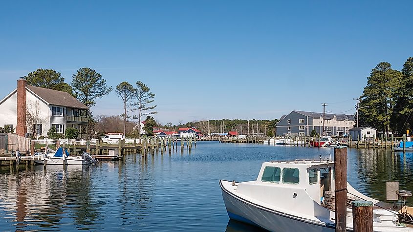 St. Michaels Harbor in historic Saint Michaels, Maryland, during spring. The town's name originates from a local Episcopal parish established in 1677, popular among tobacco growers and shipbuilders.