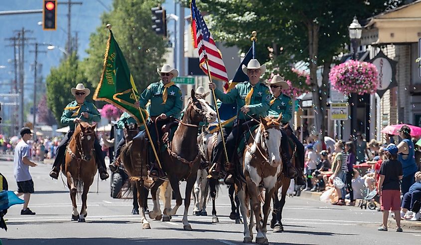 The Strawberry Festival Grand Parade moves down Main Street in downtown Lebanon, Oregon