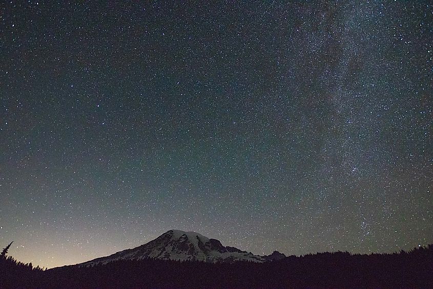 A clear night sky above Mount Rainier while standing at Reflection Lake. 