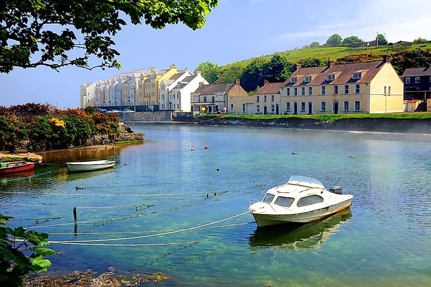 Picturesque harbor with fishing boat in the village of Cushendun, Antrim, Northern Ireland