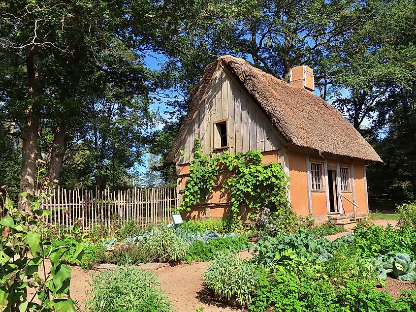 Acadian cottage with garden and fence, Historic Gardens, Annapolis Royal