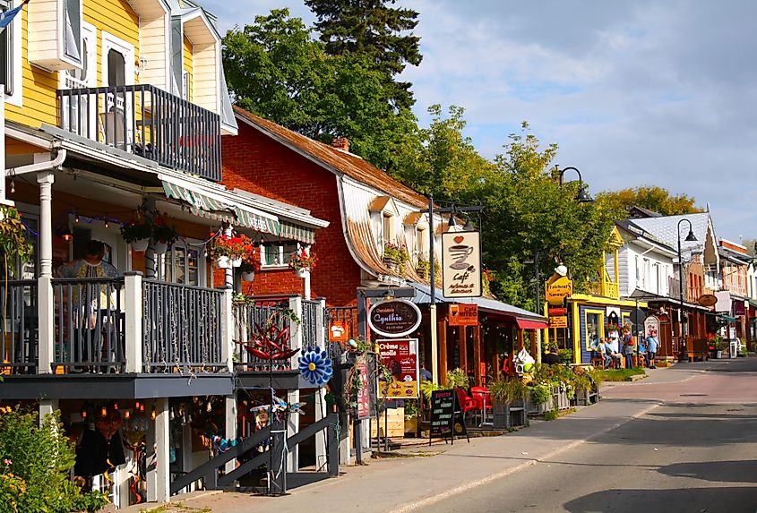 In the streets of Baie Saint Paul. Baie Saint Paul is a city in the province of Quebec in Canada known for its art galleries, shops and restaurants. Editorial credit: Juliana.B / Shutterstock.com