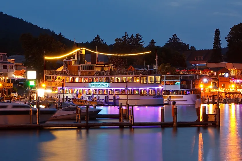People enjoying boat parties in Lake George, New York.