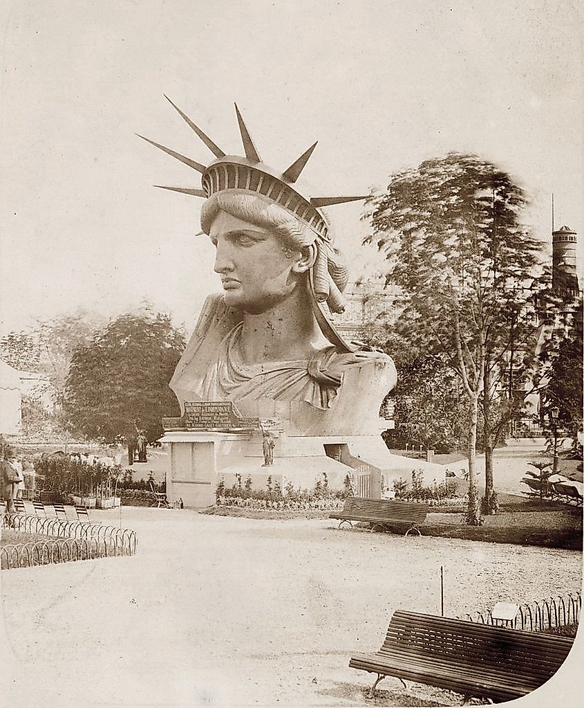 https://www.worldatlas.com/r/w768/upload/ae/47/10/846px-head-of-the-statue-of-liberty-on-display-in-a-park-in-paris.jpeg