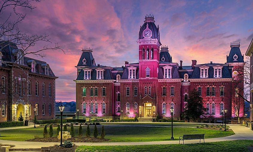 Morgantown, West Virginia: Dramatic image of Woodburn Hall at West Virginia University (WVU) as the sun sets behind the illuminated historic building.