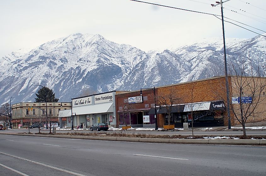 Main Street in Springville, Utah, with the snowy Wasatch Mountains in the background.