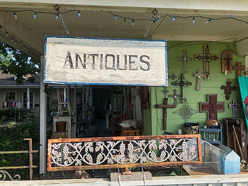 Tomball, TX / USA - May 22nd 2020: Various signs and store fronts in old town Tomball, Texas. Closures are common during coronavirus shutdown.