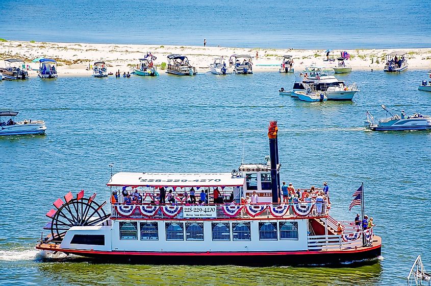 The Betsy Ann riverboat passing between Biloxi Small Craft Harbor and Deer Island in Biloxi, Mississippi. The Betsy Ann offers riverboat cruises in the area.