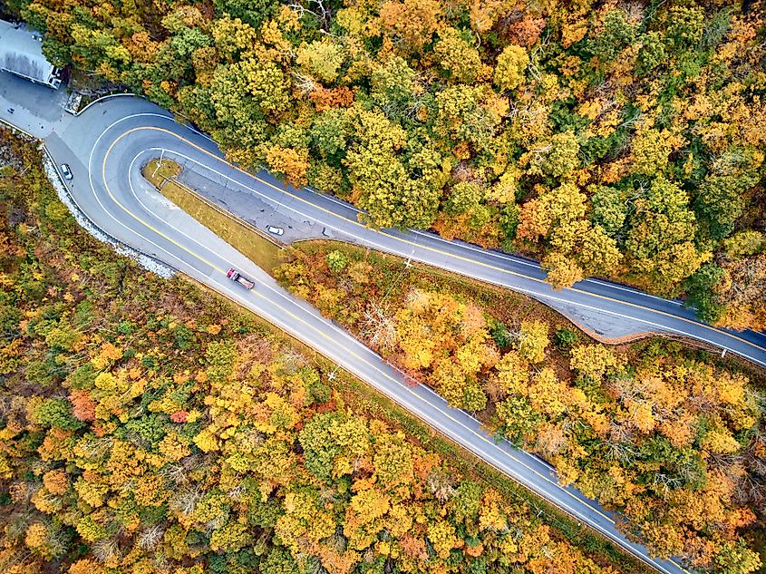 Aerial view of the scenic Mohawk Trail highway hairpin turn in autumn, Massachusetts.