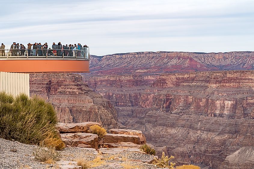 People enjoying the Skywalk at Eagle point in Grand Canyon West in Arizona.