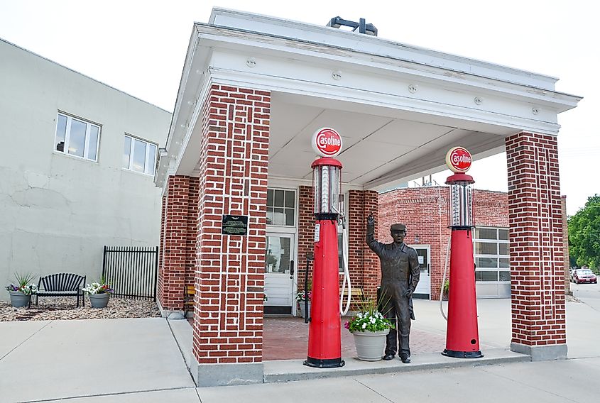 A statue of an old-time gas station attendant waves hello from Ogallala, Nebraska.