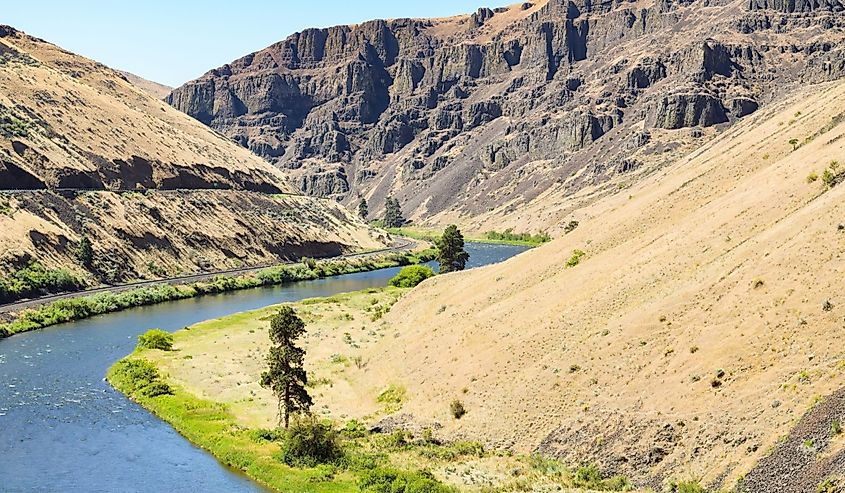 The Yakima River cuts through a dry canyon in Washington.