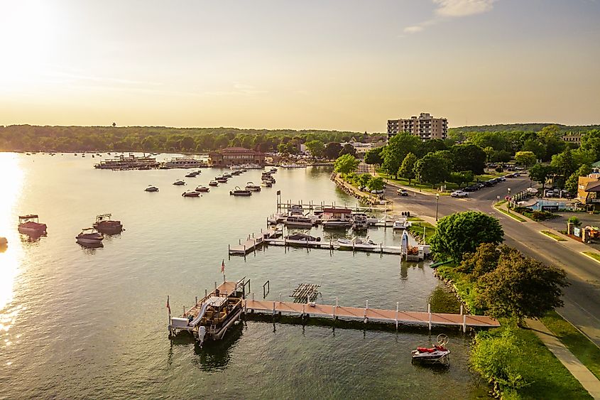 Aerial drone photo of boat piers and docks on Lake Geneva, Wisconsin.