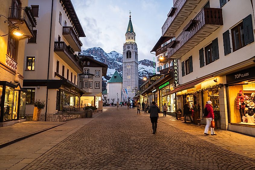 Corso Italia in the Famous Ski Resort Cortina d'Ampezzo on a Winter Evening. Editorial credit: Dietmar Rauscher / Shutterstock.com