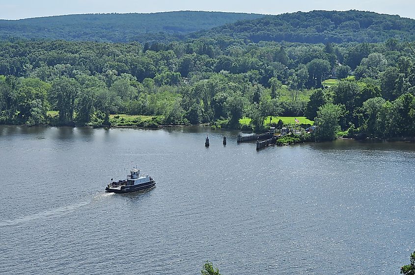 The Chester-Hadlyme ferry Selden III crossing the Connecticut River, seen from the grounds of Gillette Castle, Connecticut.
