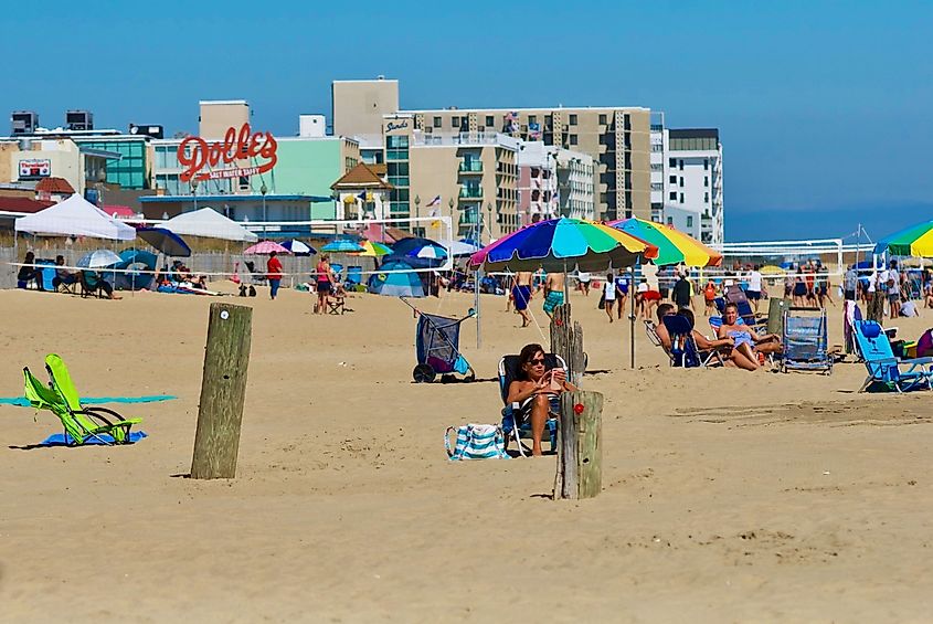 Vacationers enjoy a hot, sunny day at the beach in Rehoboth Beach, Delaware