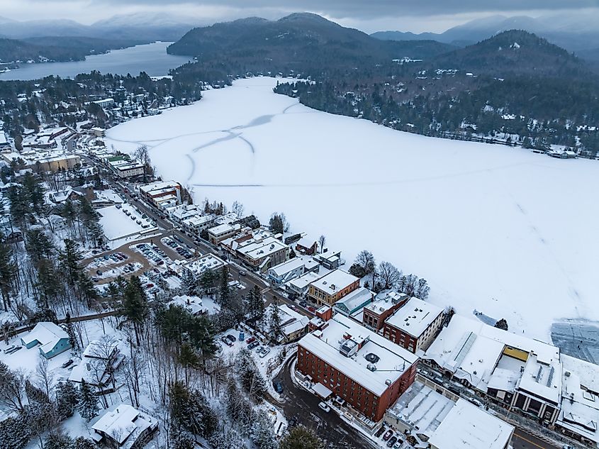 Afternoon winter aerial photo of Mirror Lake in the Village of Lake Placid, New York.