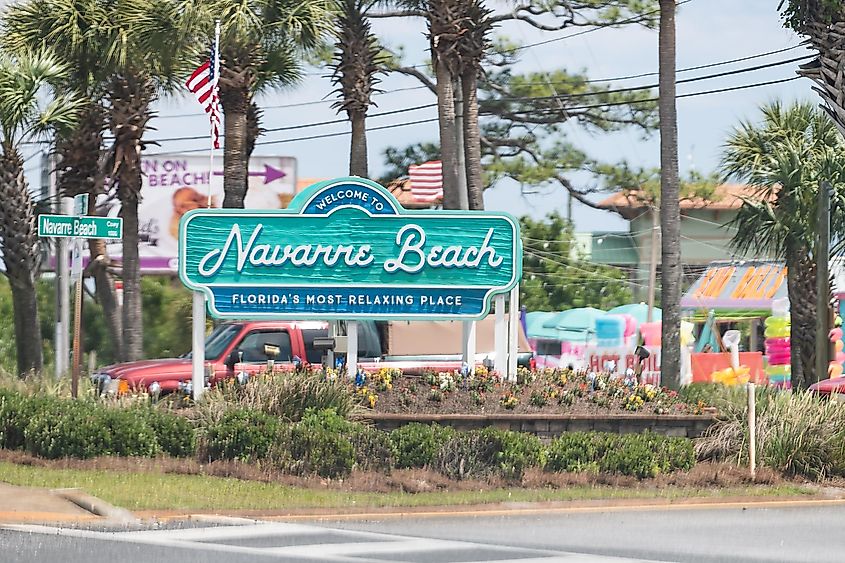 Welcome to Navarre sign on Navarre Beach, Florida, via Andriy Blokhin / Shutterstock.com