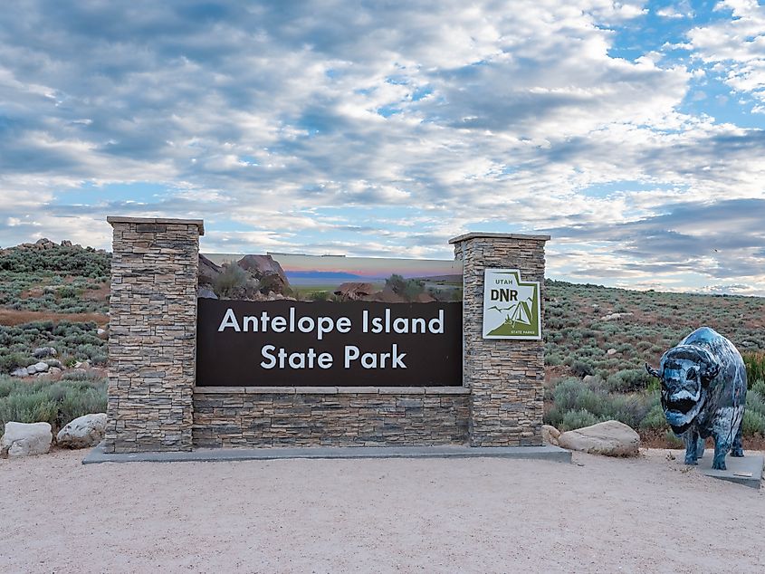 Antelope Island State Park Entrance Sign with Bison Sculpture located on The Great Salt Lake in Syracuse, Utah. Editorial credit: Richard Westlund / Shutterstock.com