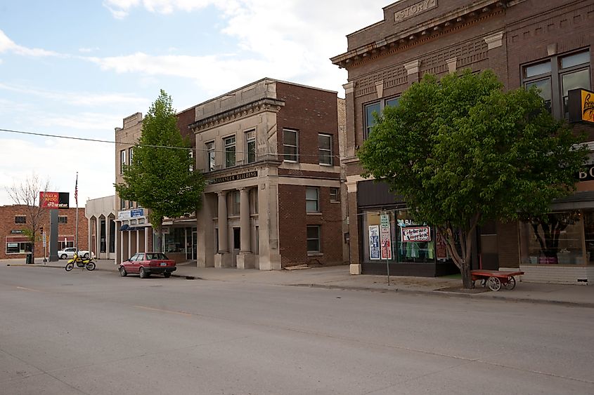 Street view of Valley City, North Dakota, with storefronts and businesses lining the main road in a small-town setting.