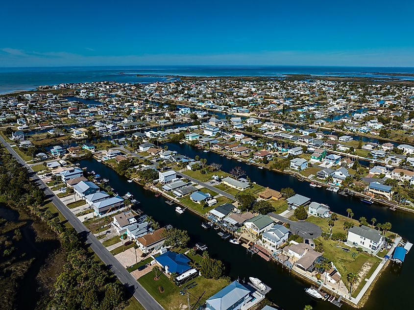 Aerial view of Hernando Beach, Florida, with a clear blue horizon and coastal scenery.