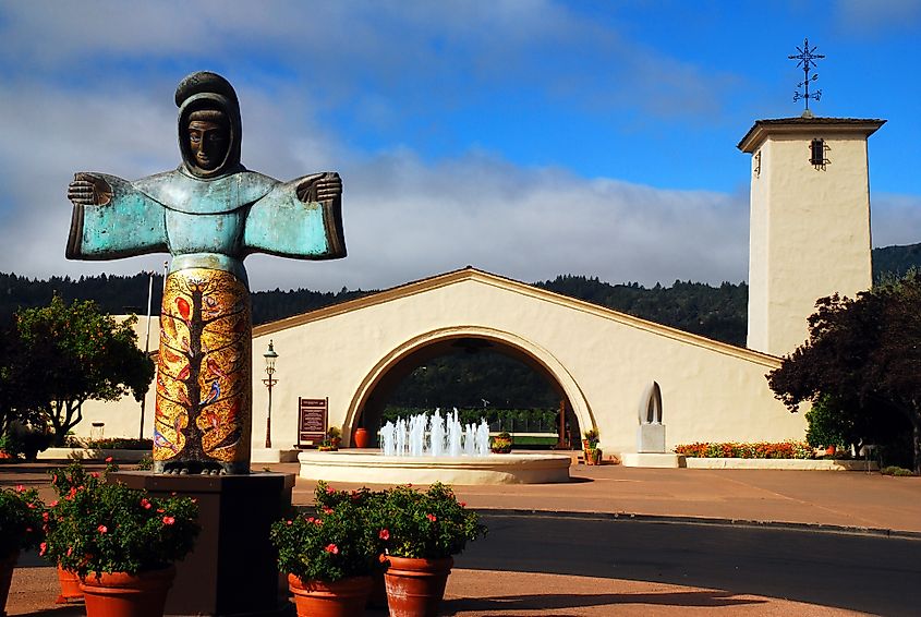 A statue of St. Francis adorns the front courtyard of a winery in St. Helena, California