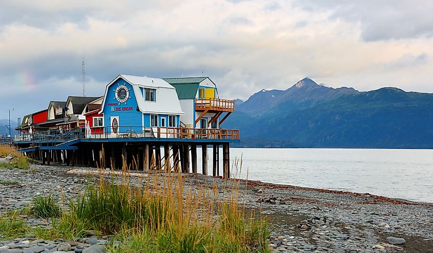 Small red shop at Home Spit Alaska after sunset.