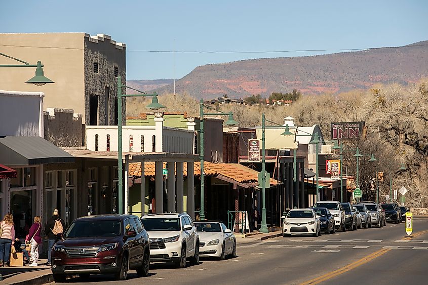 Afternoon traffic flows along Main Street in the historic downtown quarter of Cottonwood, Arizona.