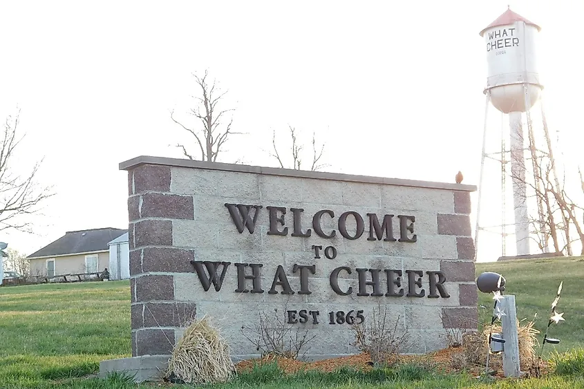 Welcome sign and water tower in What Cheer, Iowa