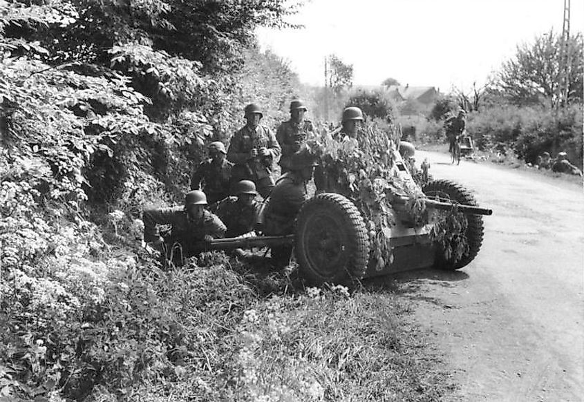 German infantry with a Pak 36 anti-tank gun in western Belgium in May 1940.