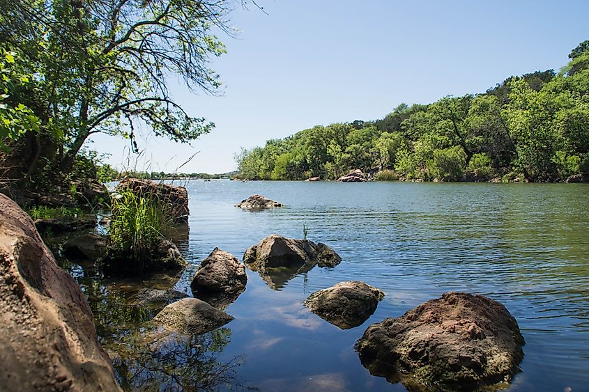 Rocks along the Colorado River in Inks Lake State Park, Texas.