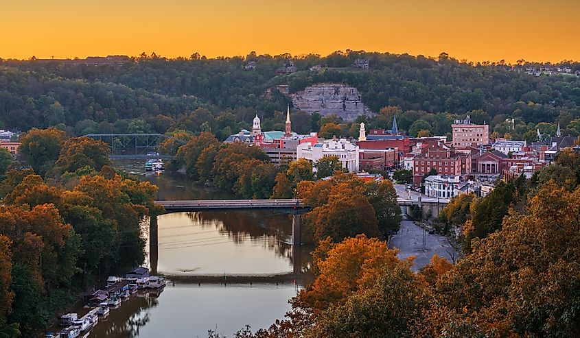 Frankfort, Kentucky, USA town skyline on the Kentucky River at dusk.