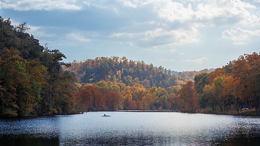 Fall foliage along a lake in Broken Bow, Oklahoma.