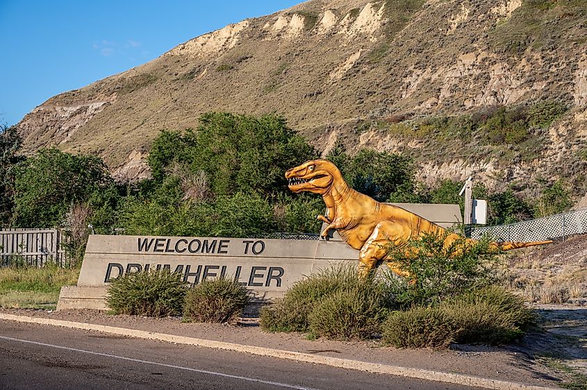 Welcome sign and dinosaur in Drumheller, Alberta.