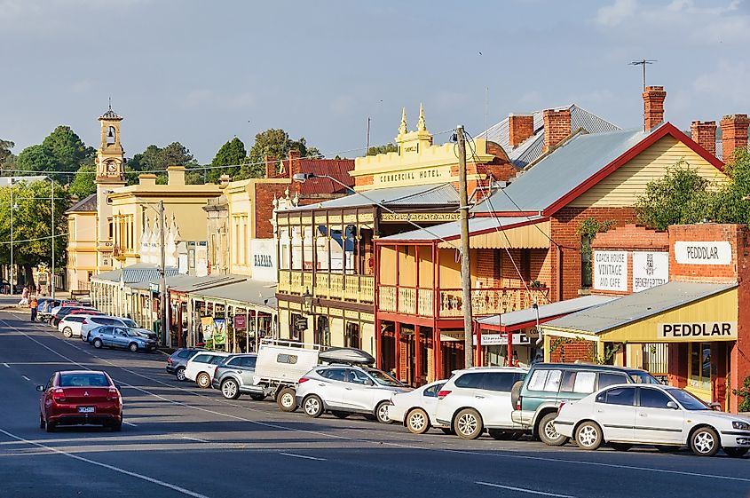 Main shopping strip lined with historic preserved buildings on Ford Street in Beechworth, Victoria, Australia.