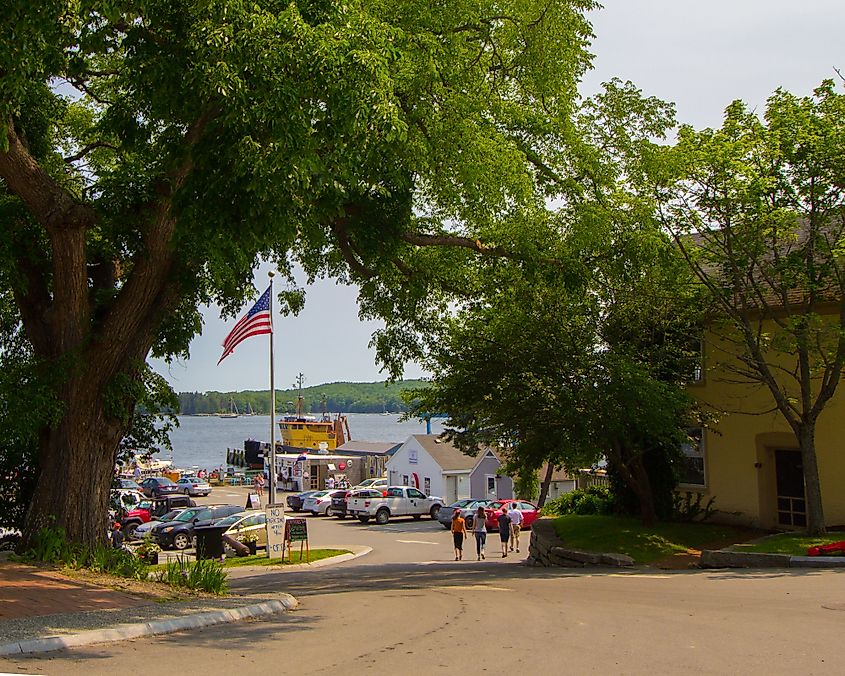 People moving towards the beach in Castine, Maine.