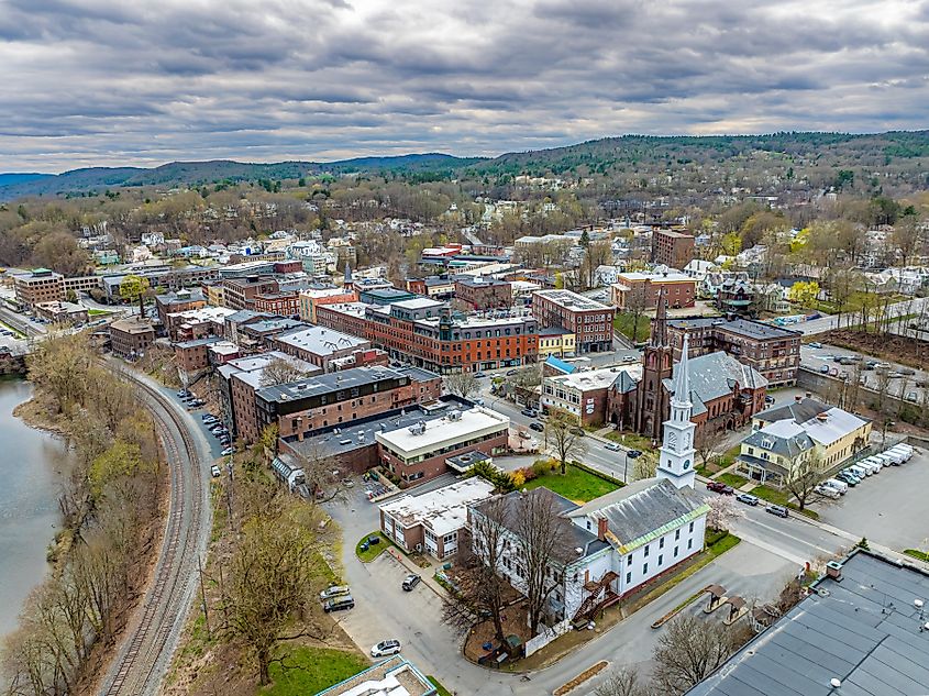 Spring aerial photo of Brattleboro, Vermont, on a partly cloudy day.