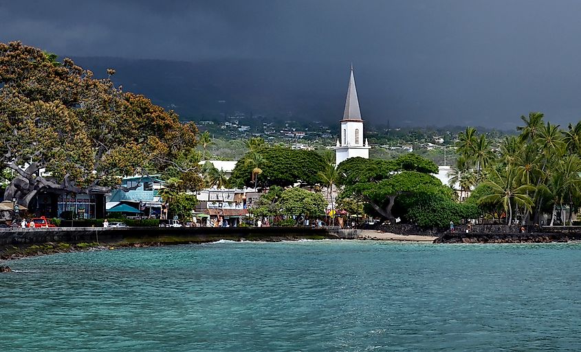 Late afternoon rain shower approaching the town of Kailua-Kona on the Big Island of Hawaii