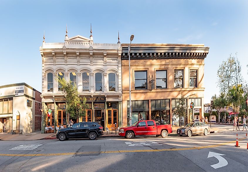 People enjoying a warm spring day in the old town of San Luis Obispo, California, along the historic Monterey Street.