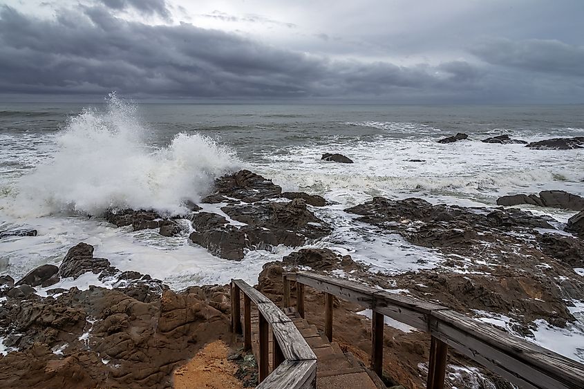 Storm waves striking a rocky Pacific coastline