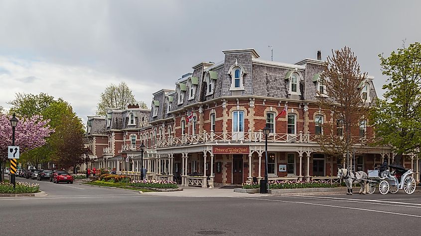 The historic Prince of Wales Hotel with horse carriage in Niagara On The Lake