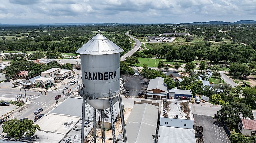 Aerial city view of Bandera around the Main St. with local stores and old water tower. Editorial credit: Mario Hagen / Shutterstock.com